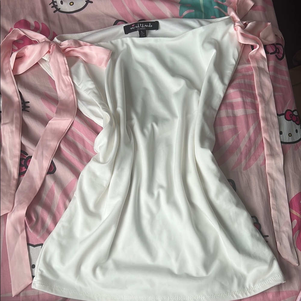 Elegant White Top with Pink Ribbon Details